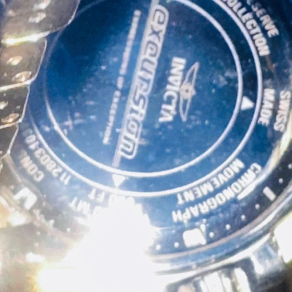 Invicta Reserve Excursion Gold and Silver High Polish watch.